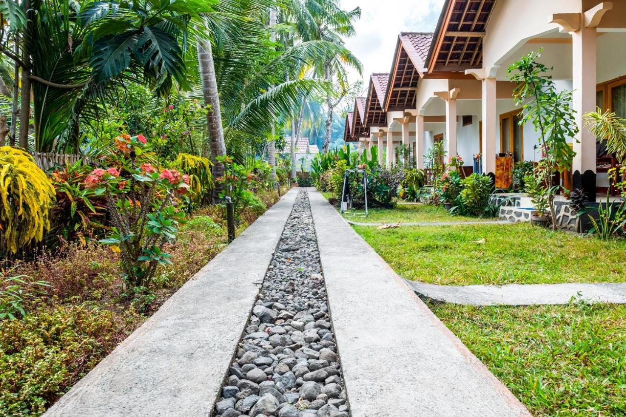 Oyo 1259 Kuta Garden Homestay Экстерьер фото